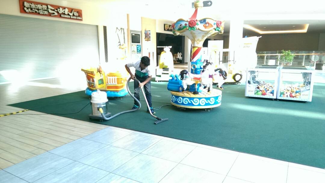 Cleaning crew working in a shopping mall