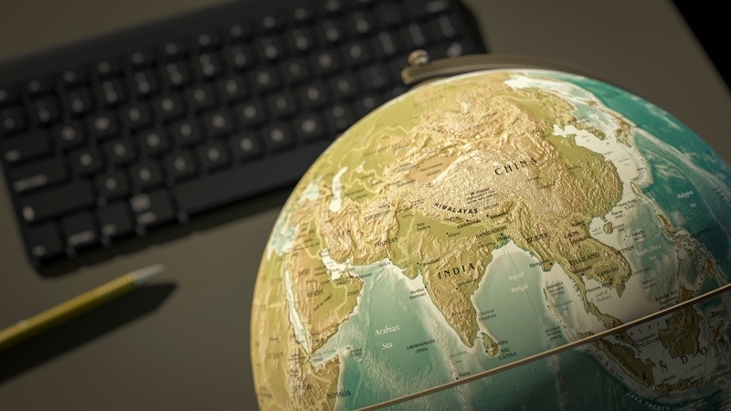 Globe on a desk representing customer service